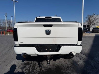 2014 RAM 1500 4WD Quad Cab 6.4 Ft Box Sport