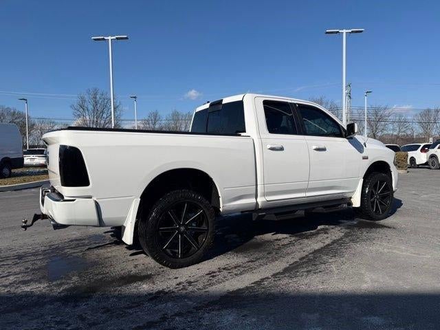 2014 RAM 1500 4WD Quad Cab 6.4 Ft Box Sport